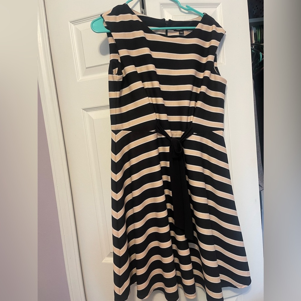 Powder pink and black tripped dress.